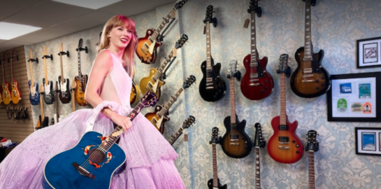 an image of taylor swift in a purple ball gown carrying a blue guitar with coi fish super imposed over an image of the inside of black rose guitar house. the wall is covered in guitars