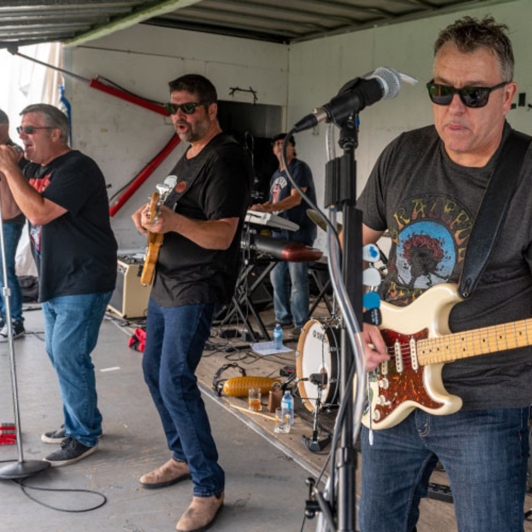 A band performing on a stage 